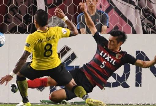 Paulinho strikes as Guangzhou Evergrande progress on away goals