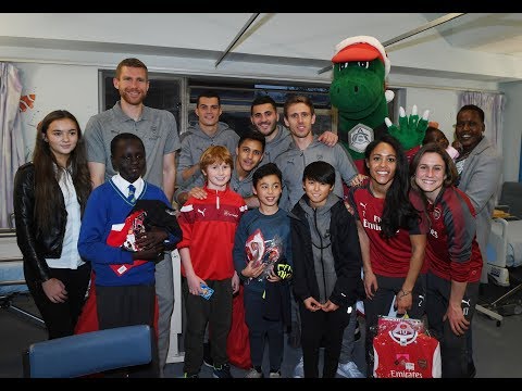 Arsenal players spread some festive cheer in local hospitals and schools