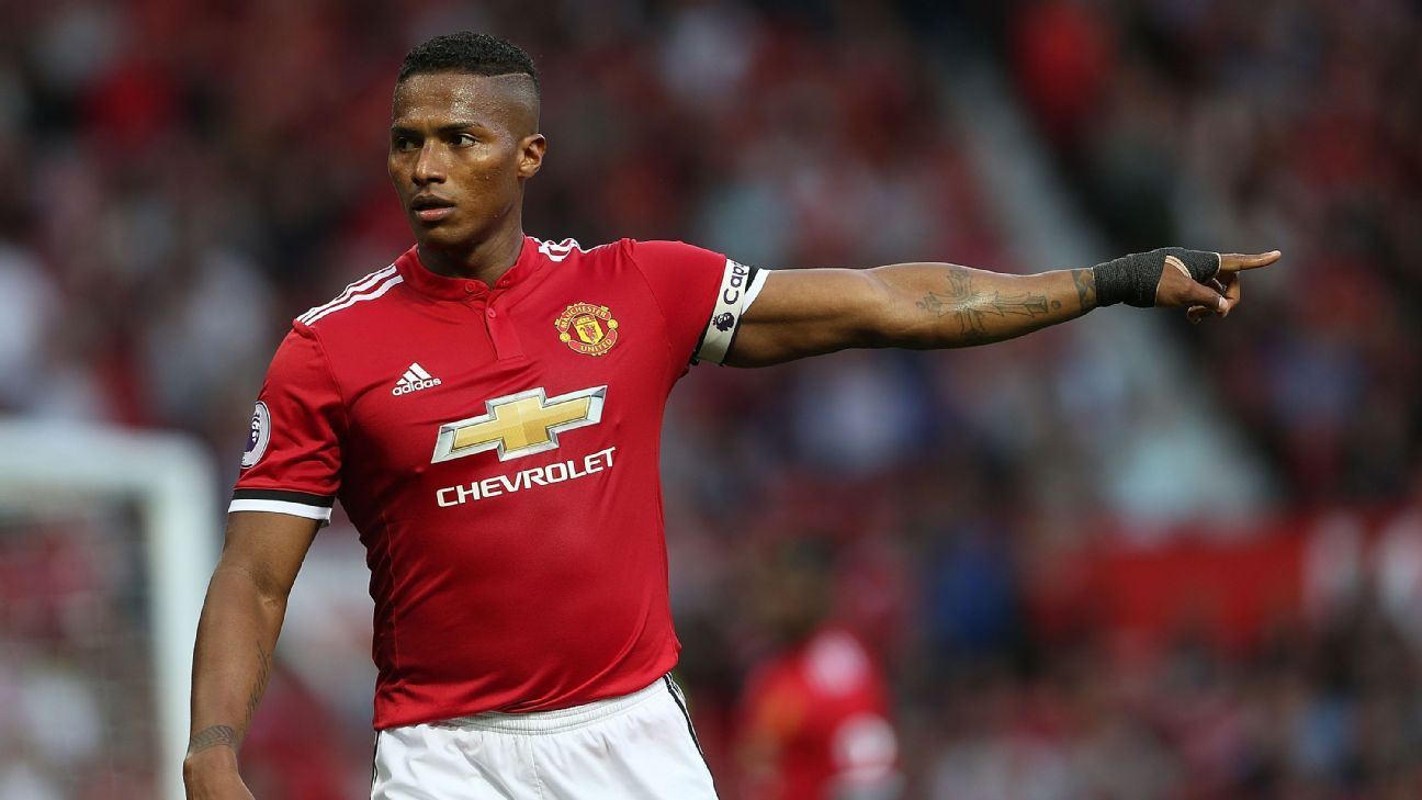 Manchester United's Antonio Valencia limps off injured in friendly