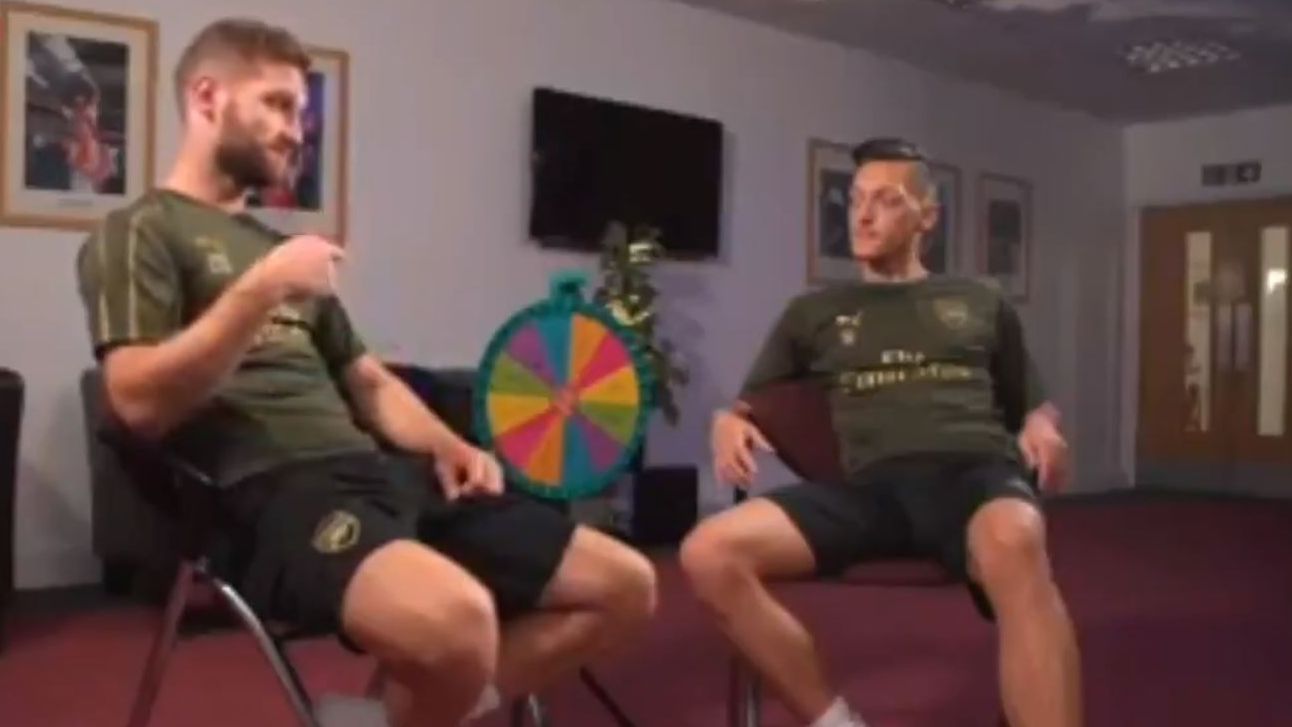 Arsenal's Mesut Ozil, Shkodran Mustafi answer questions set by spin of the wheel