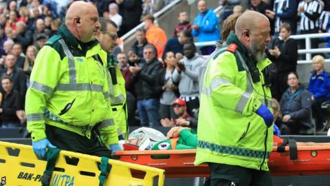 Brighton's Murray taken to hospital after head clash