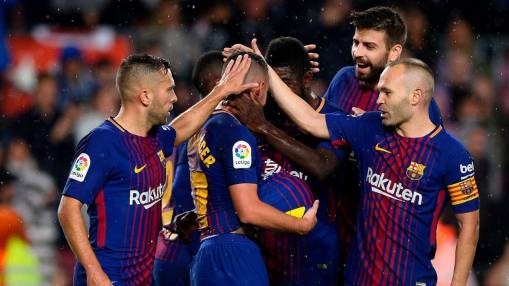 Paco Alcacer brace guides Barcelona to victory over Sevilla