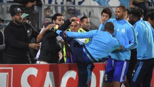 Marseille crowd slam Evra for kicking fan