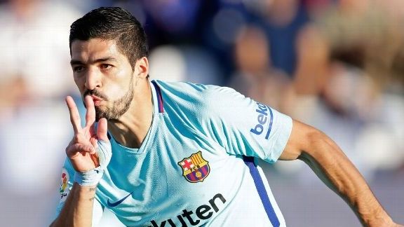 Suarez back scoring, Messi quiet