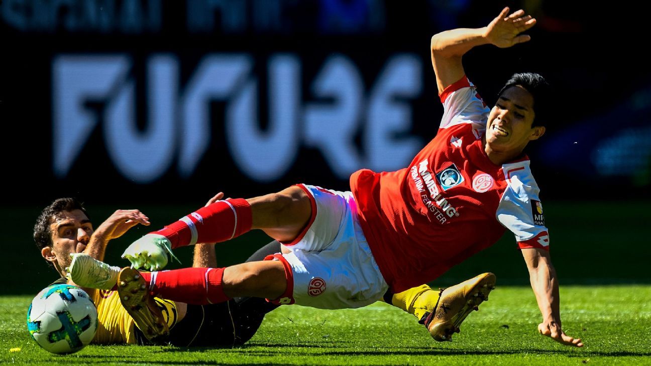 Newcastle sign Japan's Yoshinori Muto, as Rafa Benitez expresses concerns