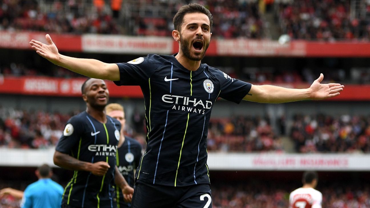 Manchester City begin title defence with easy Arsenal win; Mane brace in Liverpool rout