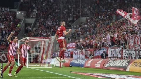 Olympiakos charged over fans' behaviour in Burnley game