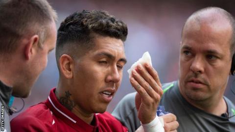 Liverpool striker Firmino 'OK' after eye 'scare'