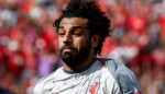 Salah sends Reds top