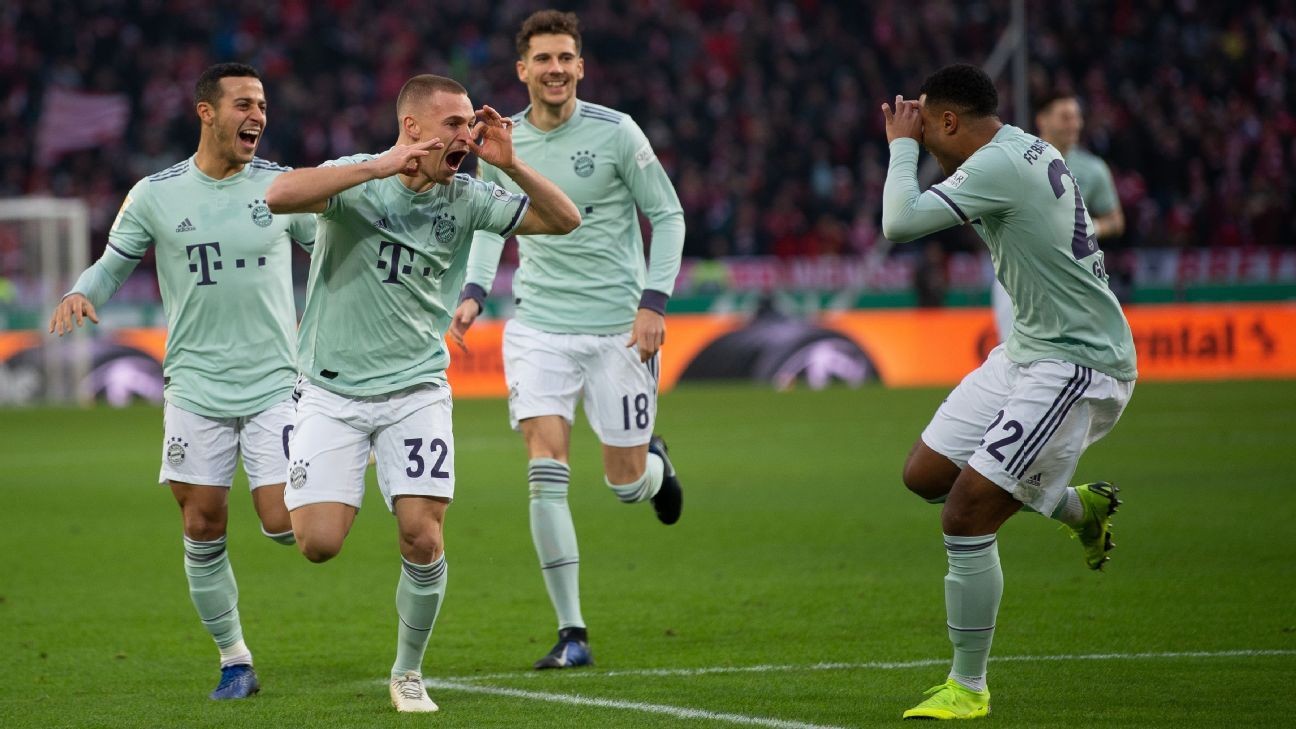 Bayern Munich hammer Hannover to keep pressure on Dortmund