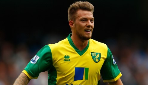 Cook eyes Pilkington deal lift