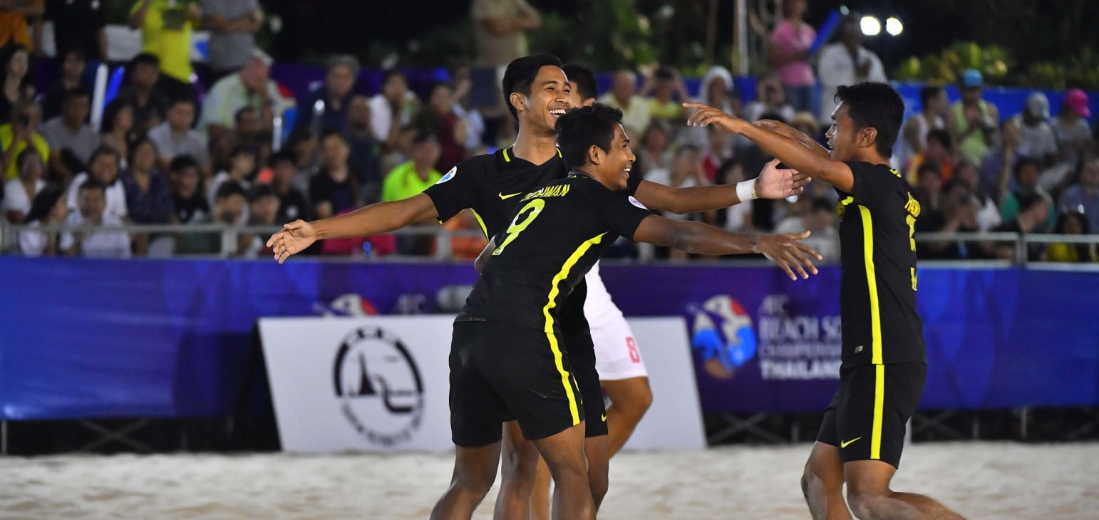 Group A: Malaysia 5-4 Thailand