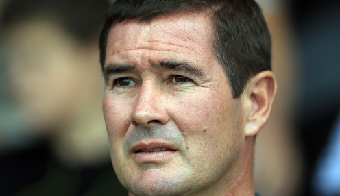 Clough cools play-off hopes