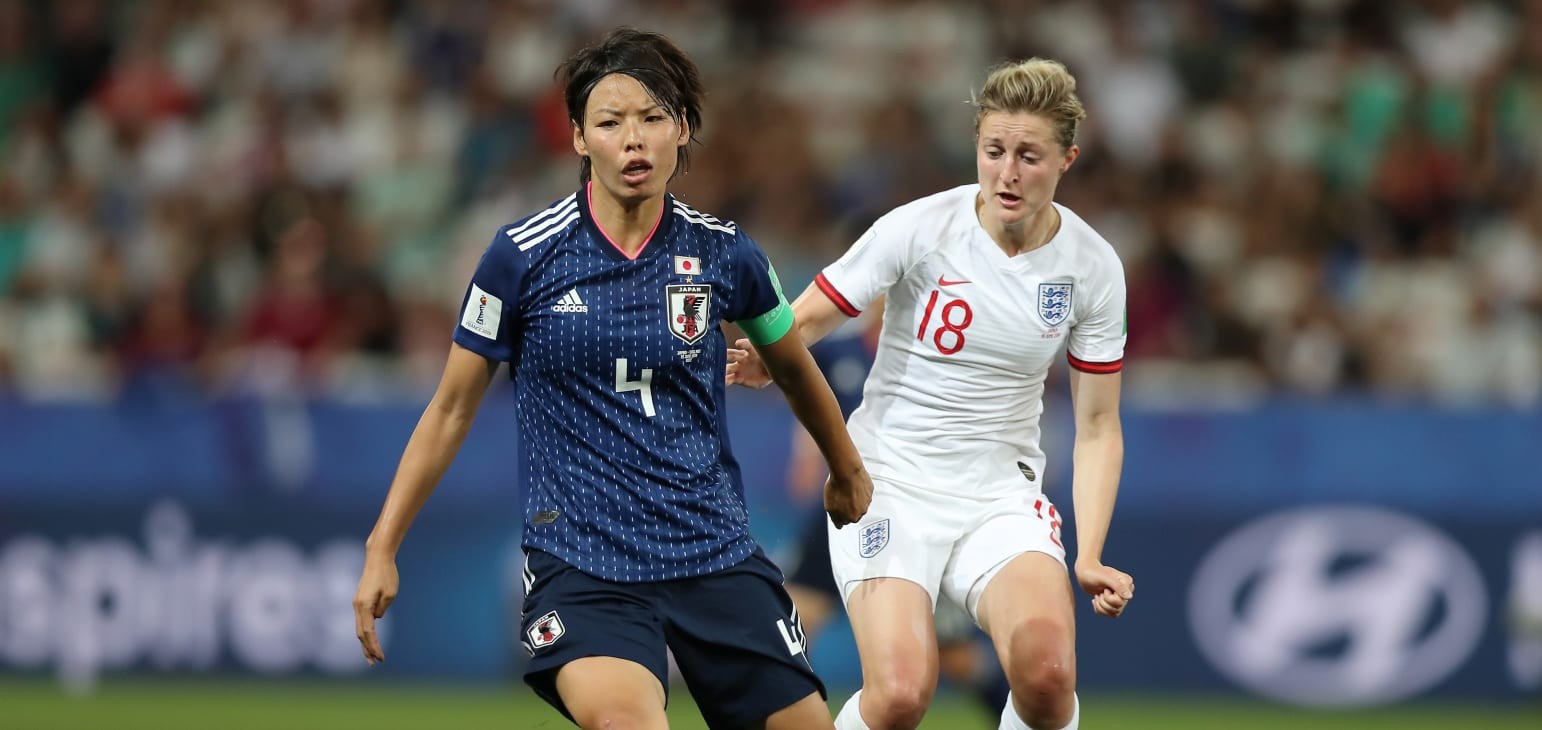Japan fall to White's double