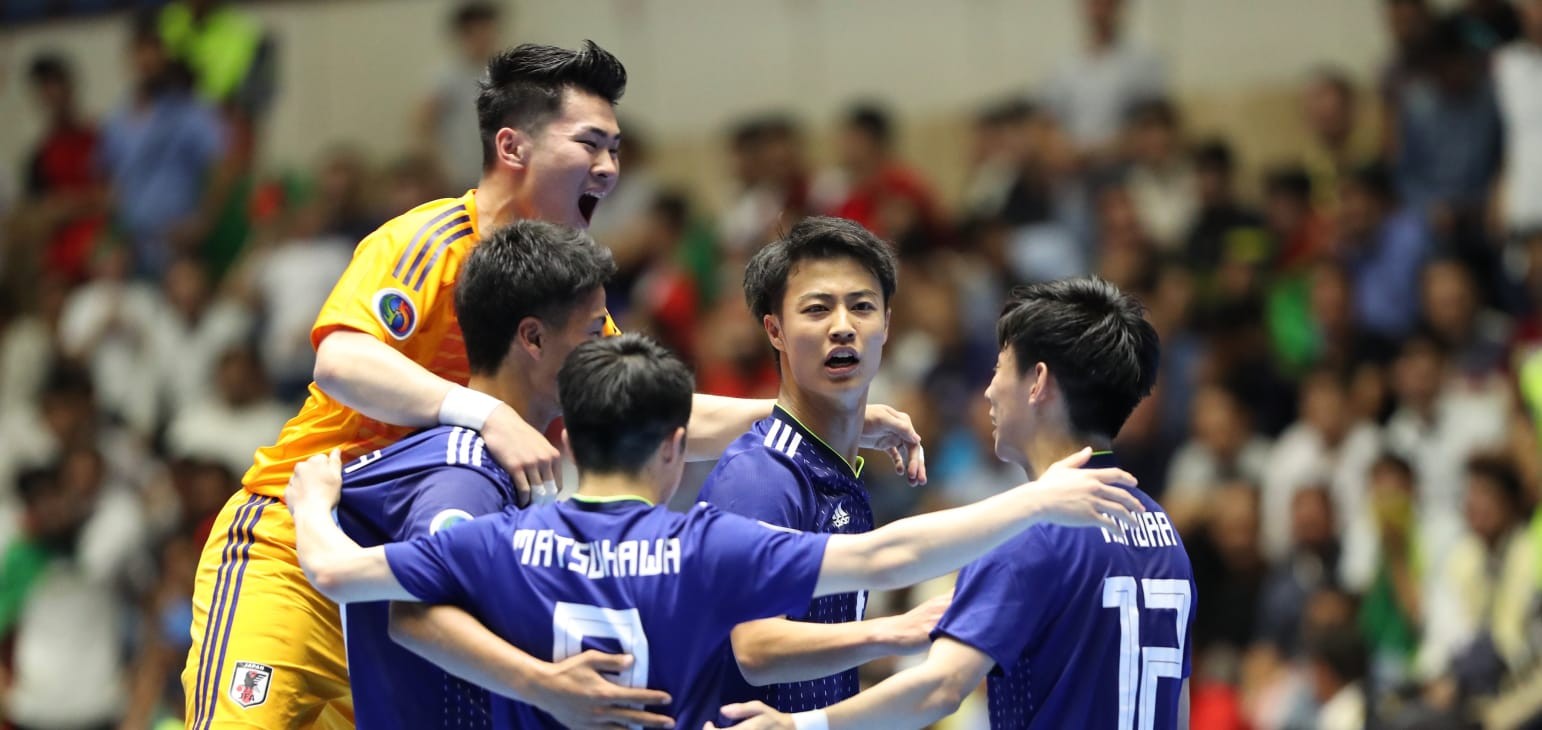 Japan surge to title