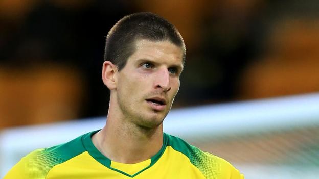 Timm Klose: Norwich defender out for 'lengthy spell' with knee ligament injury