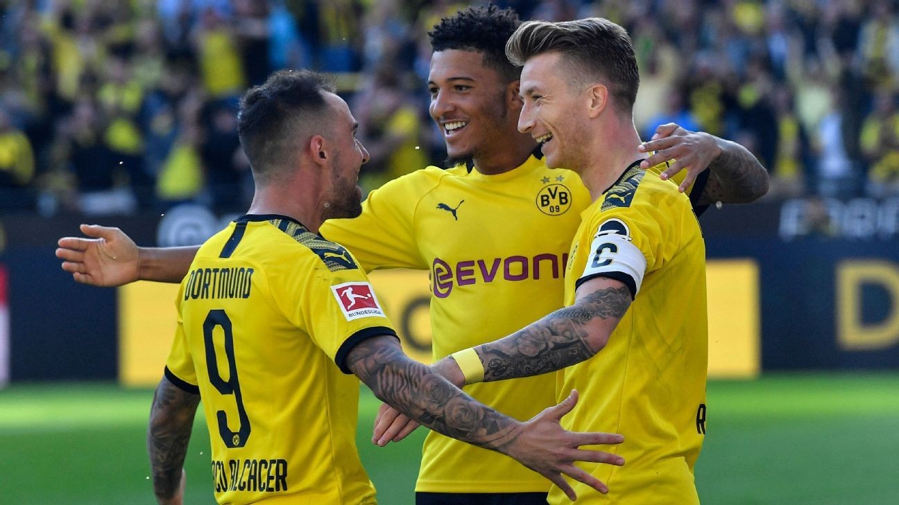 Reus scores twice as Dortmund crush Leverkusen