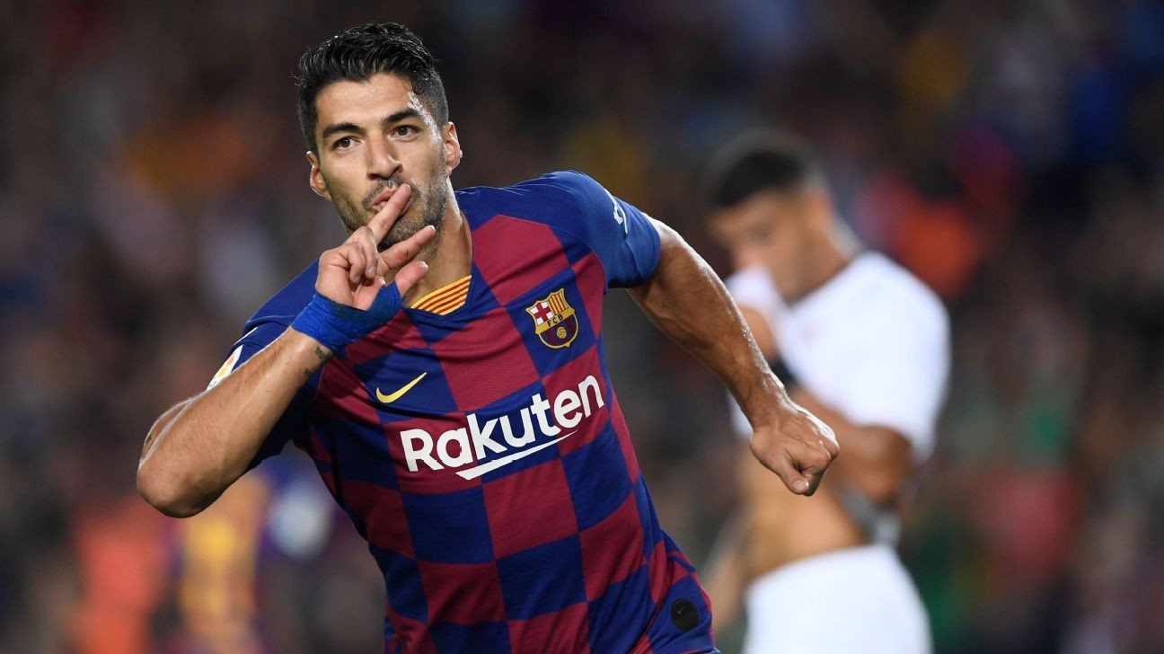 Sublime Luis Suarez, Lionel Messi goals lift Barcelona into second