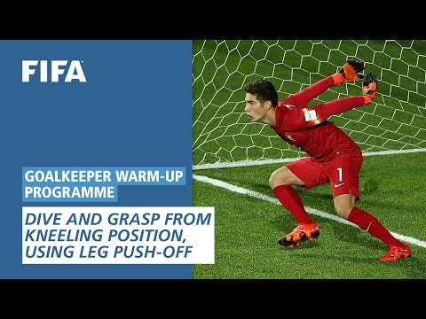 Dive and grasp from kneeling position, using leg push-off [Goalkeeper Warm-Up Programme]