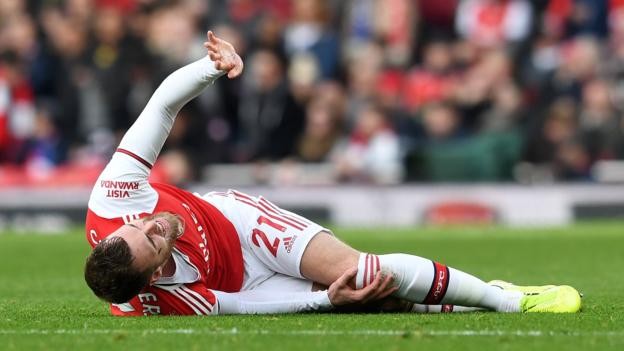 Calum Chambers: Arsenal centre-back out for up to nine months with ruptured knee ligament