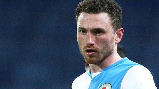 Corry Evans: Blackburn midfielder fractures skull and shatters eye socket