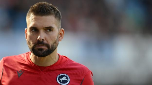 Bartosz Bialkowski: Millwall make goalkeeper's deal permanent after loan from Ipswich