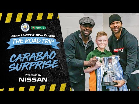 CUP FINAL MASCOT SURPRISED WITH TROPHY