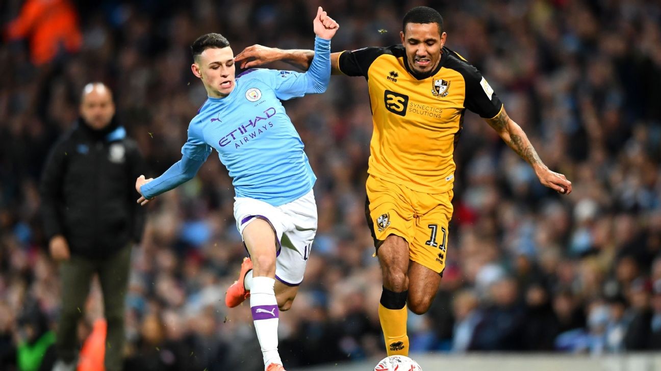 Manchester City's Phil Foden flouts social distancing in beach kickabout