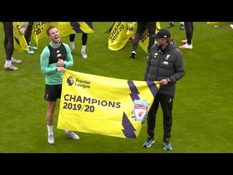Liverpool presented with Premier League champions flags at Melwood