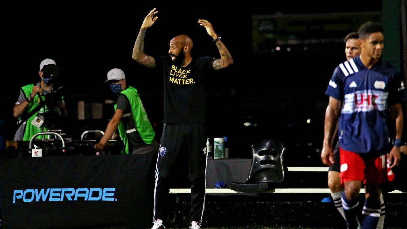 Henry kneels for 8 mins, 46 secs in BLM protest