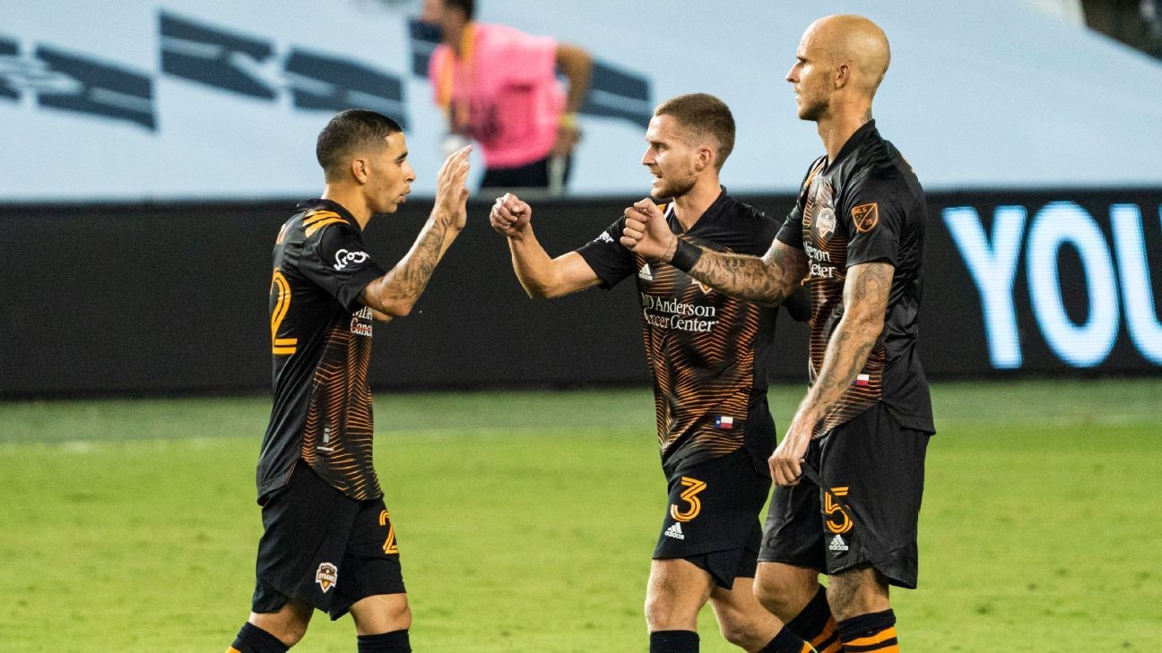 Dynamo notch first win with upset at Sporting KC
