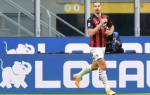 Ibrahimovic derby double sends AC Milan top of Serie A