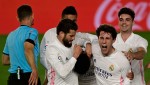 Real Madrid battle to victory over Osasuna & close gap at La Liga summit