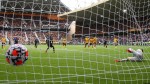 Kane returns as Tottenham edge past Wolves