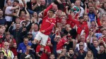 Ronaldo scores two on Man United return
