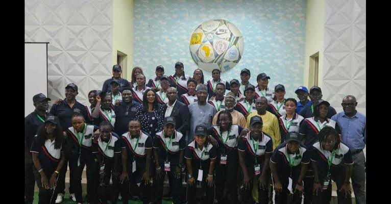 Women coaches bag CAF C-License certificate